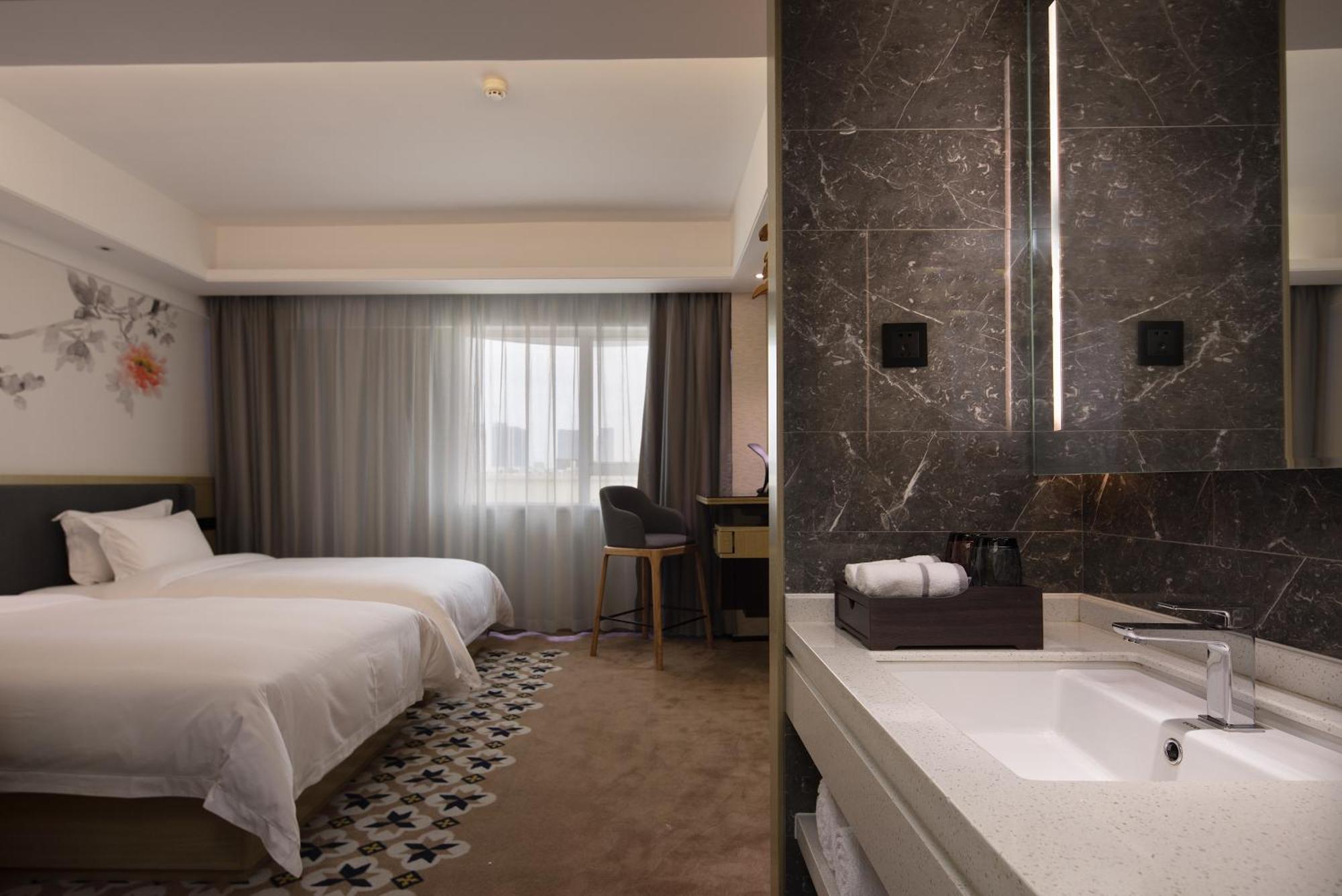 Paco Hotel Guangzhou Jiangtai Road Metro Branch Buitenkant foto