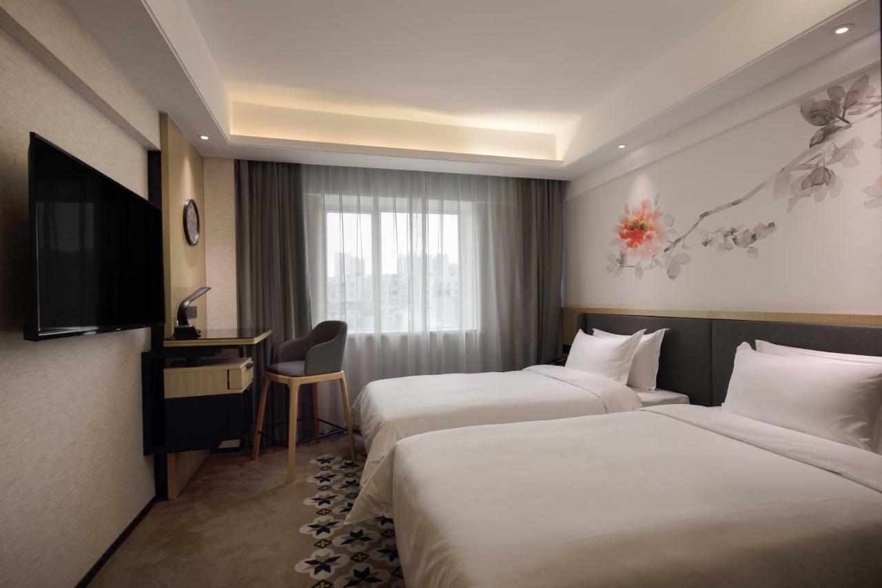 Paco Hotel Guangzhou Jiangtai Road Metro Branch Buitenkant foto